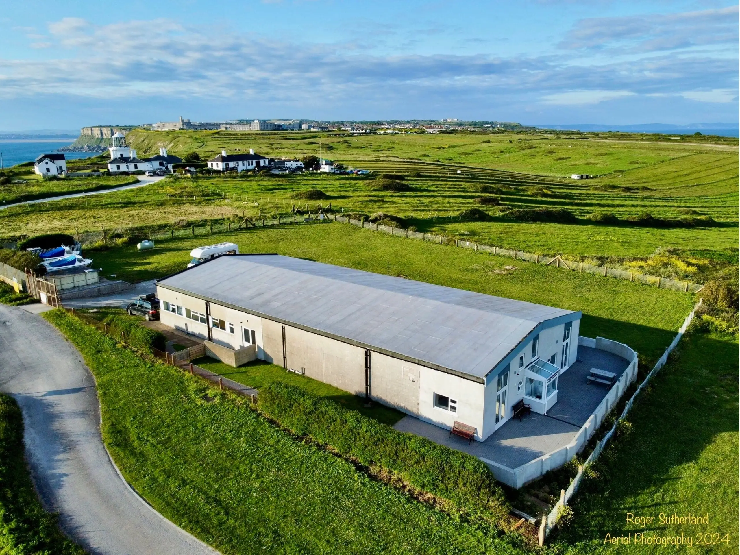 Lighthouse and cottages near the Portland Bunkhouse
